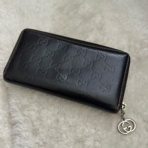 Authentic Gucci Long Zip Monogram Wallet with charm 🤎